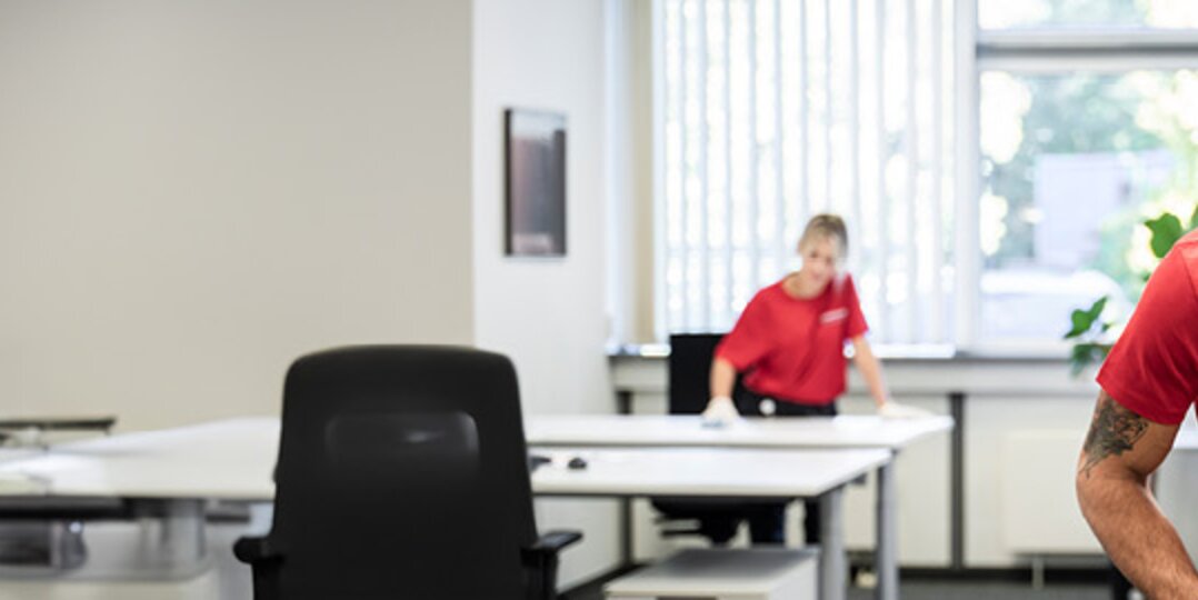 Cleaner vacuums office 